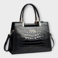 Amaya | Bolso de Mano Brillante con Textura Cocodrilo